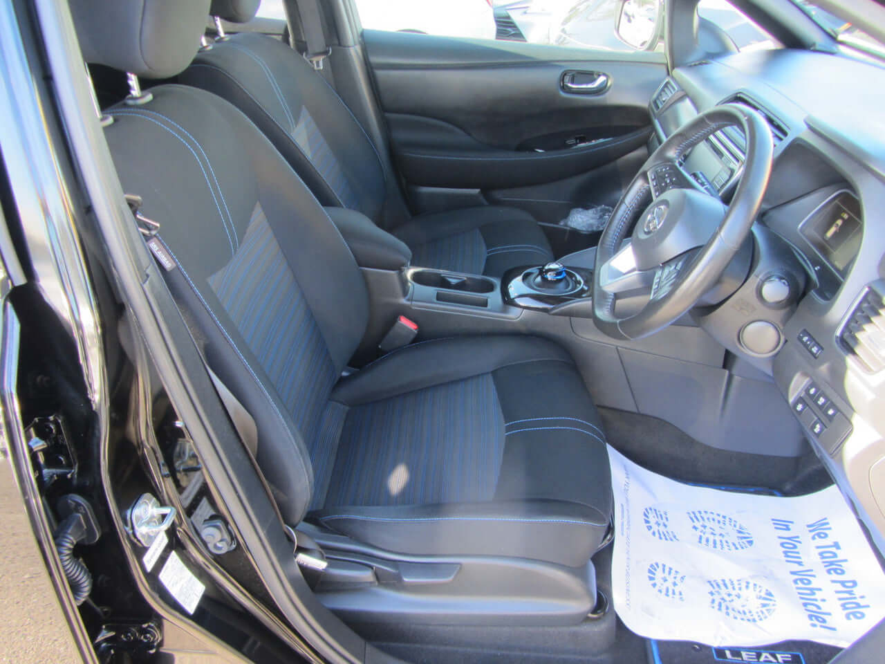 Interior view of the 2019 Nissan Leaf e+ 62kW X-Edition Full Electric showing seating and dashboard.