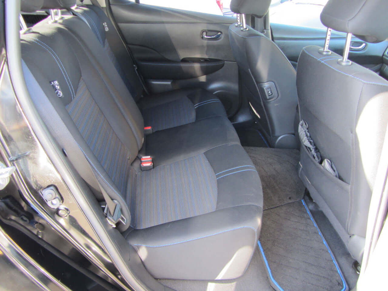 Interior view of the backseat of a 2019 Nissan Leaf e+ 62kW X-Edition Full Electric showcasing spacious seating.