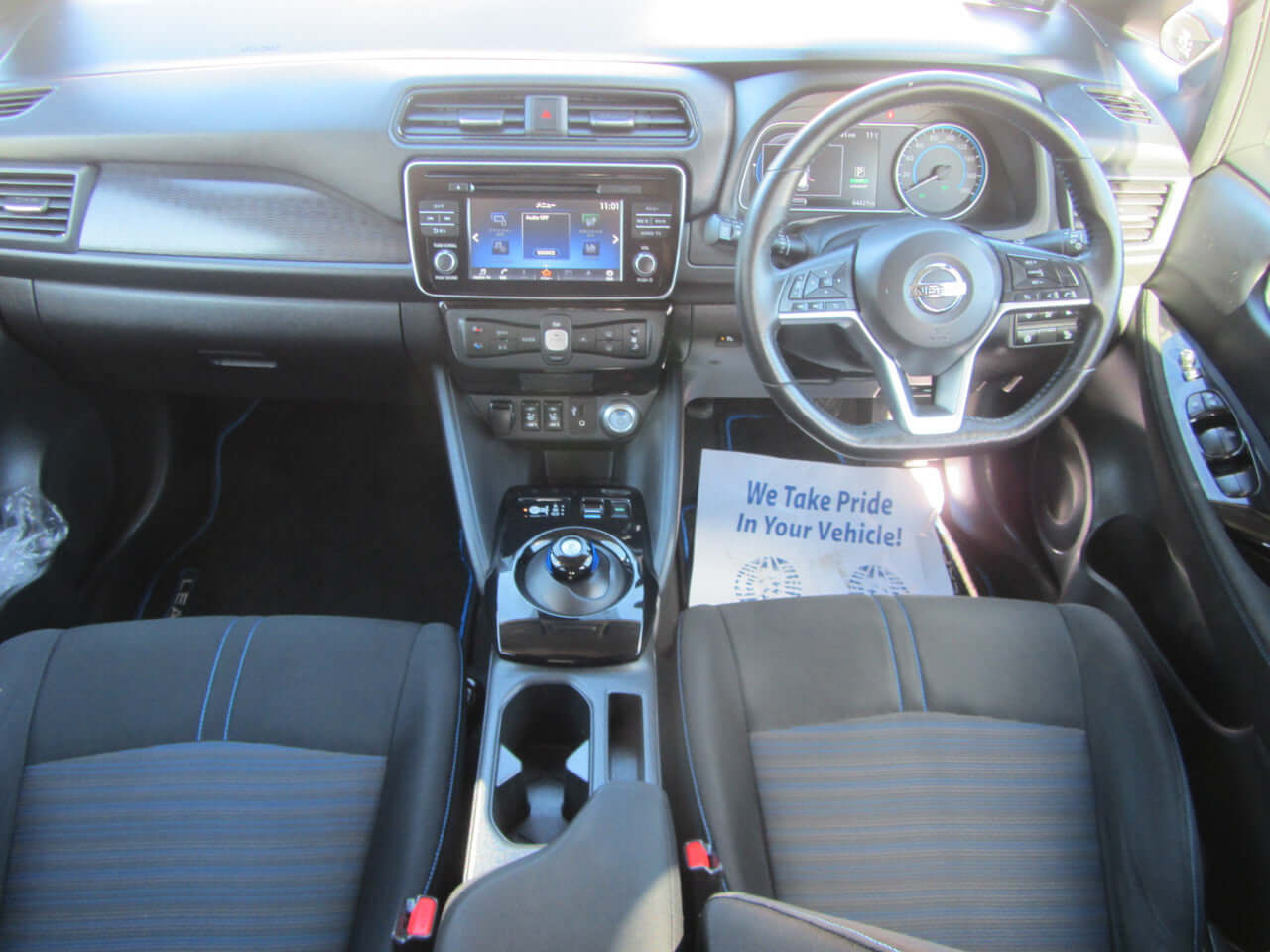 Interior view of 2019 Nissan Leaf e+ 62kW X-Edition Full Electric, showcasing dashboard and seats.