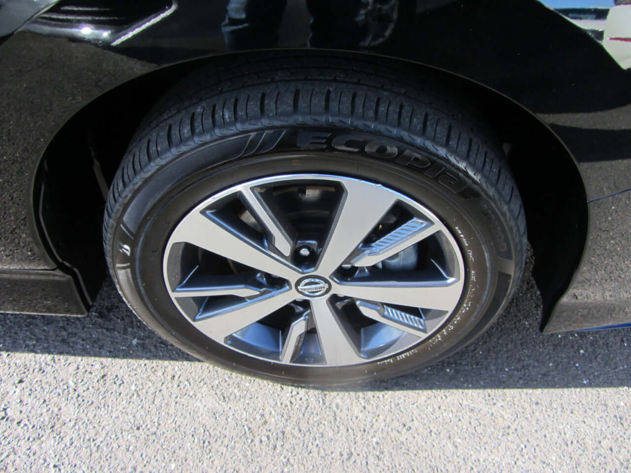 Close-up of a 2019 Nissan Leaf e+ 62kW X-Edition Full Electric wheel and tire showing design details.