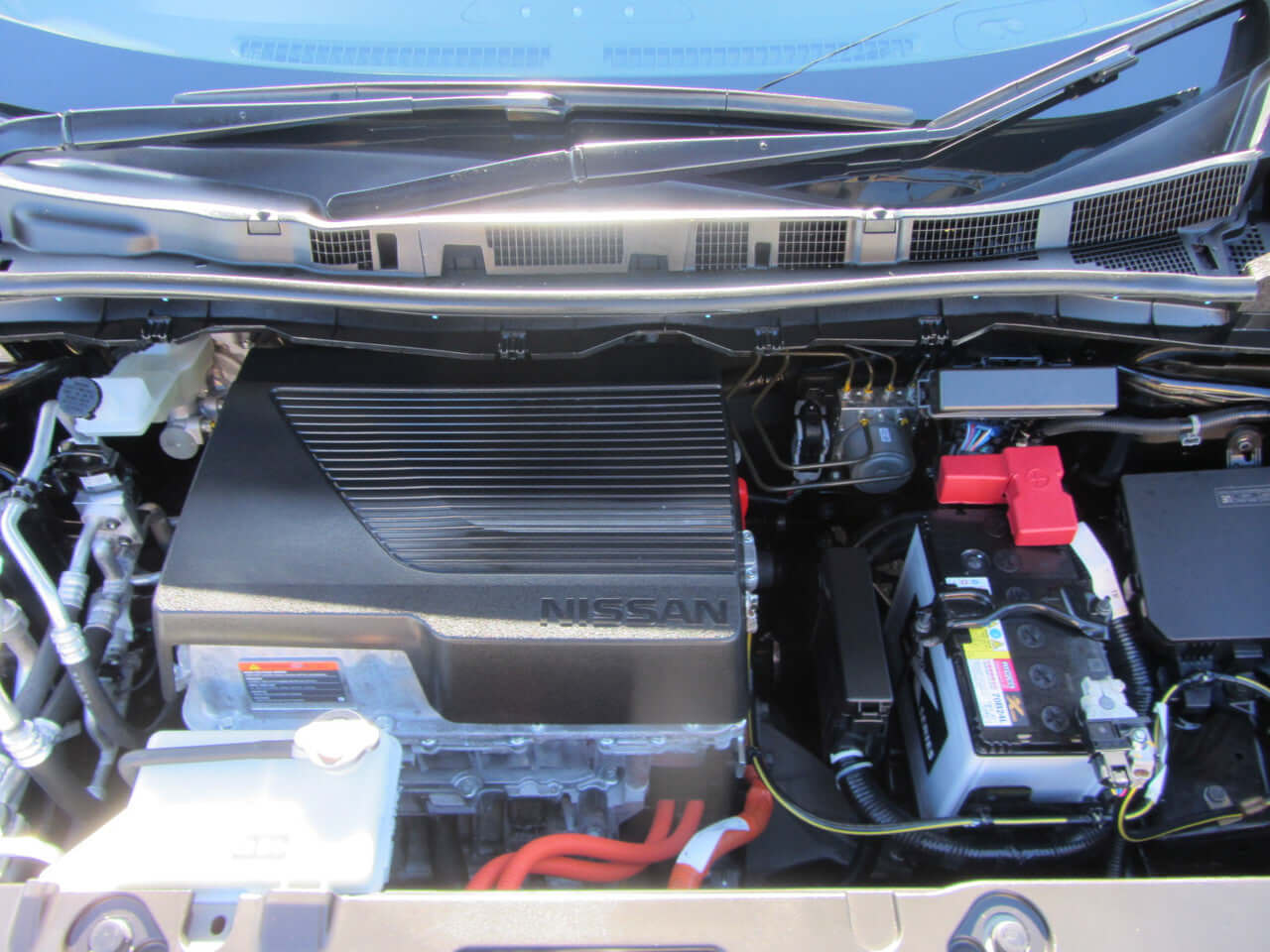 2019 Nissan Leaf e+ 62kW X-Edition Full Electric engine compartment showcasing electric motor and battery components.