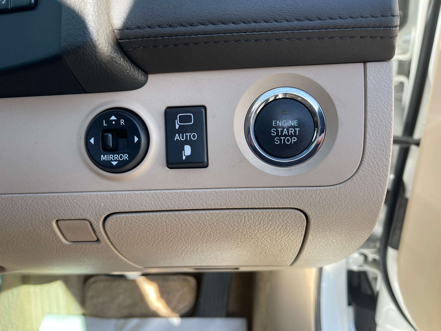 2008 Toyota Crown V6 3.0L interior controls including mirror, auto, and engine start/stop buttons.