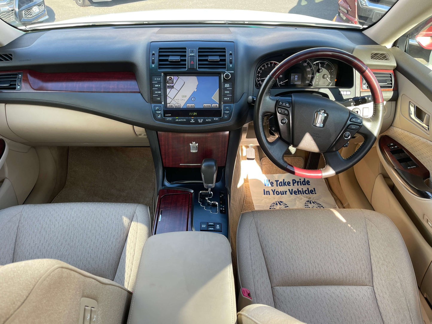 Interior view of the 2008 Toyota Crown V6 3.0L Royal Saloon Luxury Sedan showing dashboard and seats.