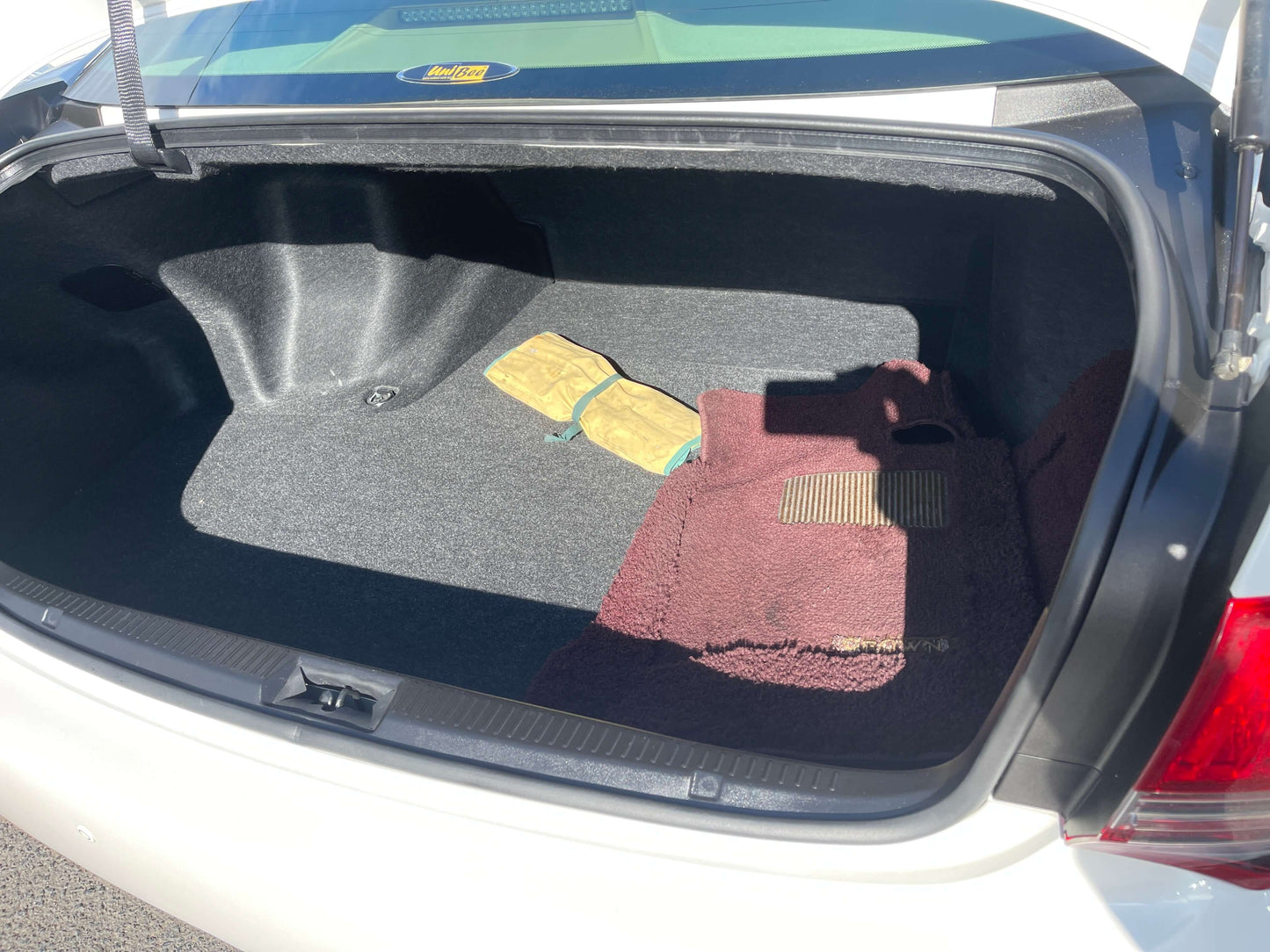 Inside the trunk of a 2008 Toyota Crown V6 3.0L Royal Saloon, showing spacious cargo area.