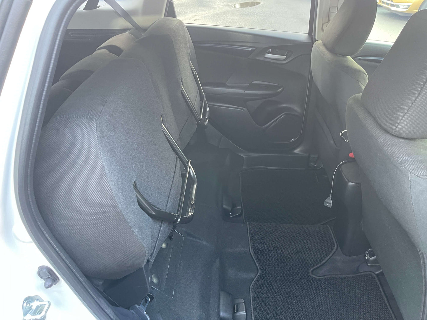 Interior view of the back seats in a 2021 Honda Shuttle Hybrid X Honda Sensing Edition 5 seater.