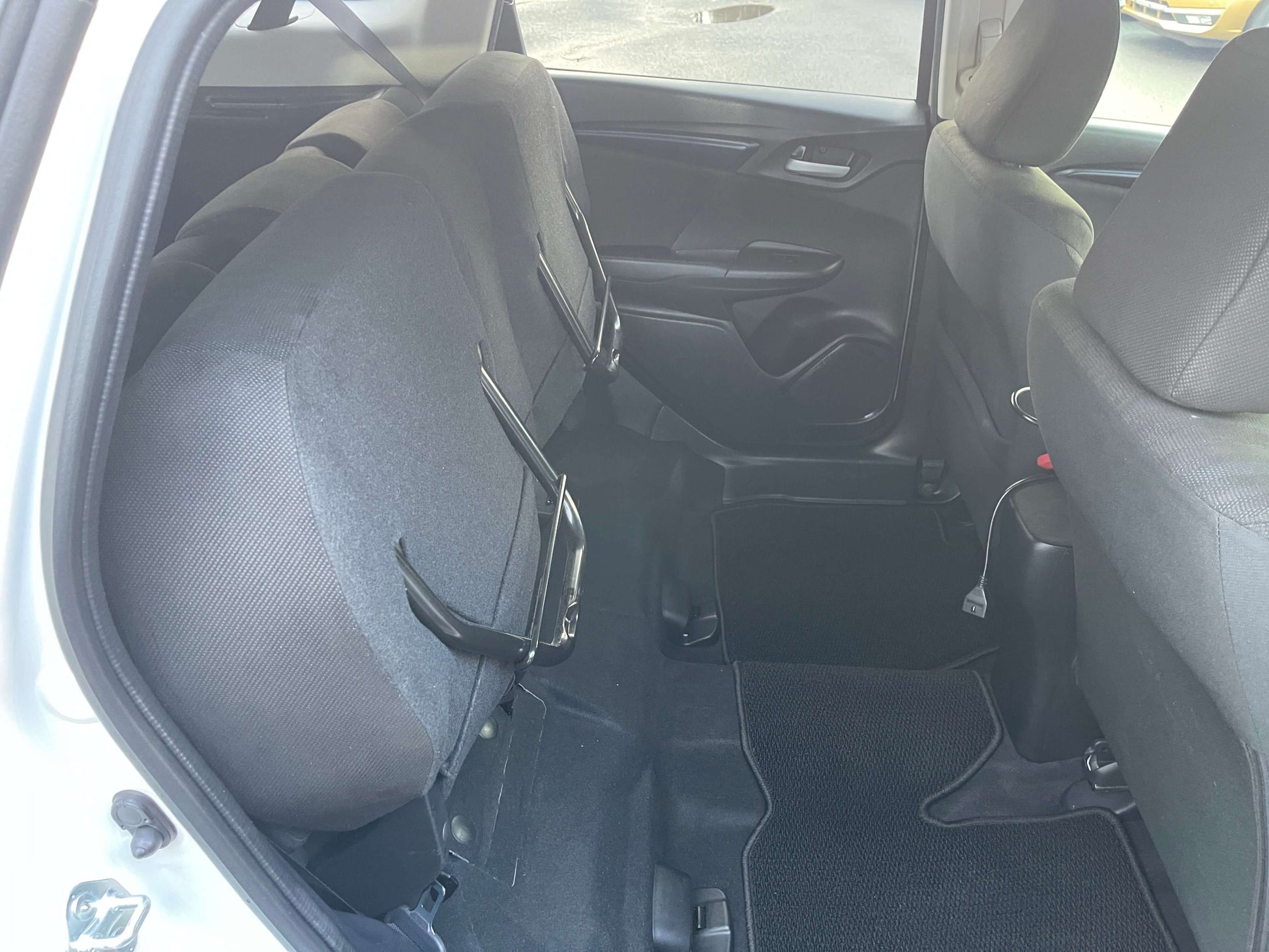 Interior view of the back seats in a 2021 Honda Shuttle Hybrid X Honda Sensing Edition 5 seater.