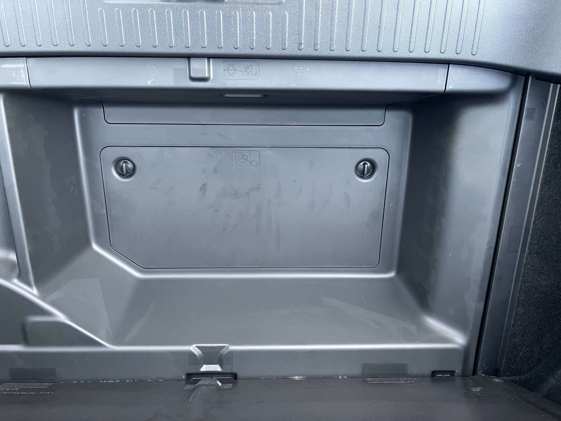 Storage compartment inside the 2021 Honda Shuttle Hybrid X Honda Sensing Edition's dashboard.