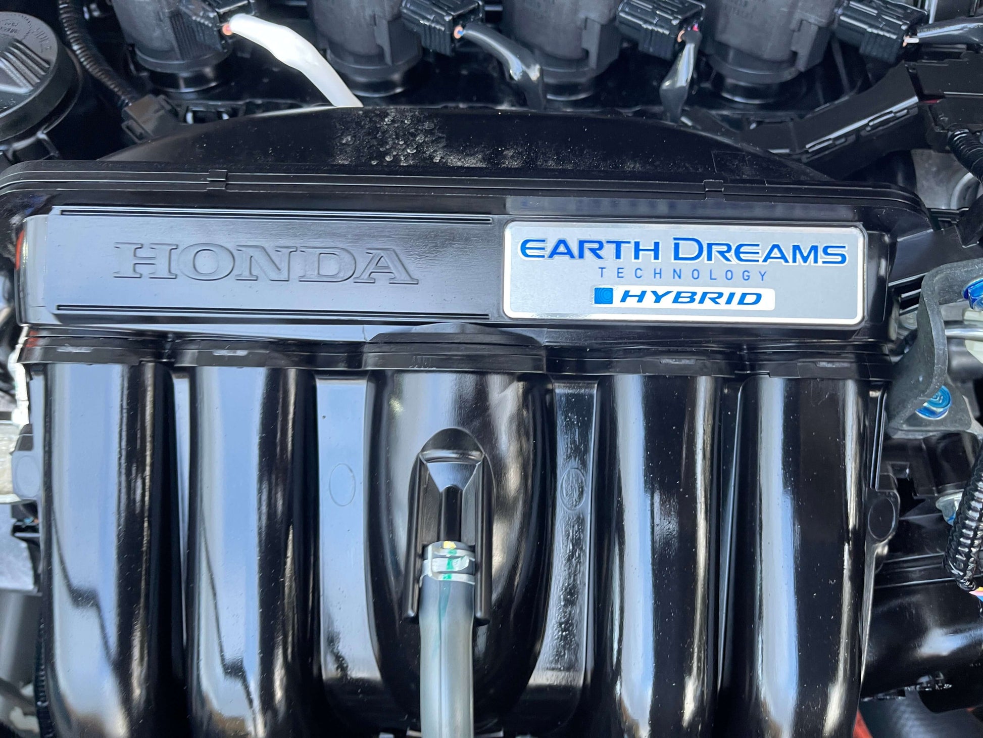 2021 Honda Shuttle Hybrid engine showing Earth Dreams Technology and Hybrid system components