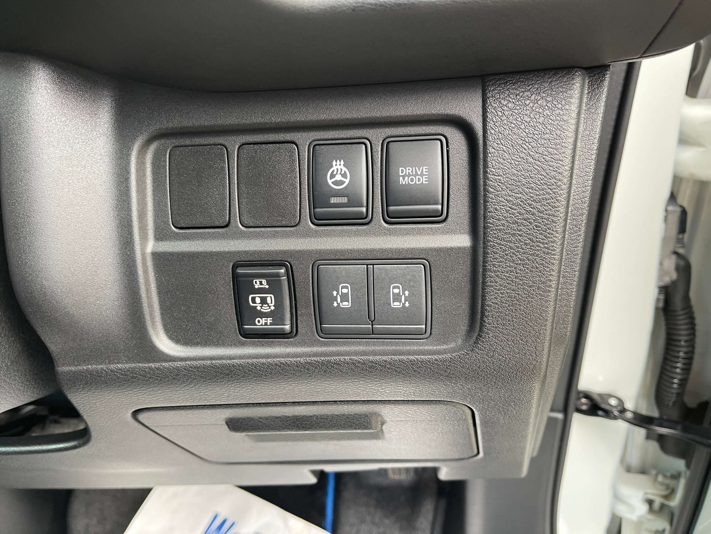 Interior control panel of the 2018 Nissan Serena 1.2 e-Power featuring drive mode and other settings.