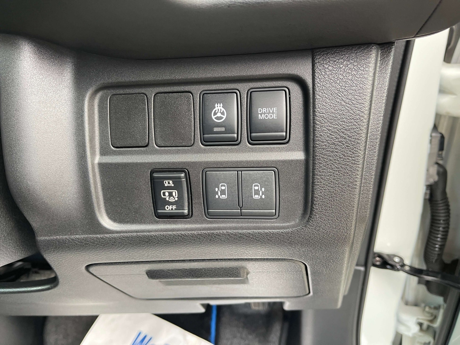 Interior control panel of the 2018 Nissan Serena 1.2 e-Power featuring drive mode and other settings.