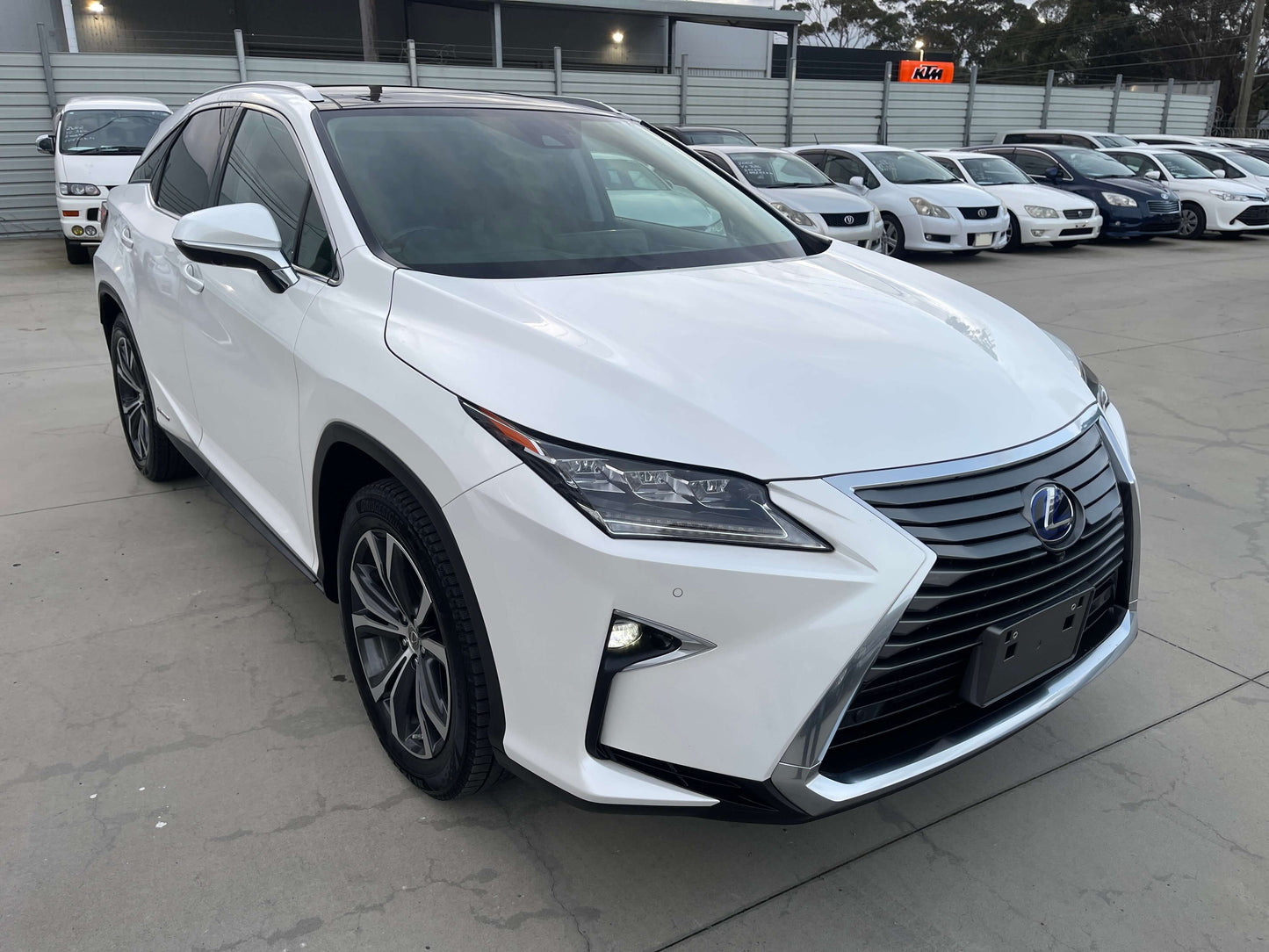 2017 Lexus RX450H V6 3.5L Hybrid L Version Luxury SUV in white with sporty design and LED lights