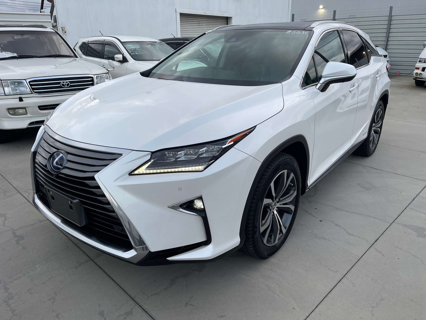 2017 Lexus RX450H V6 3.5L Hybrid L Version Luxury SUV in white with modern design and sleek lines.