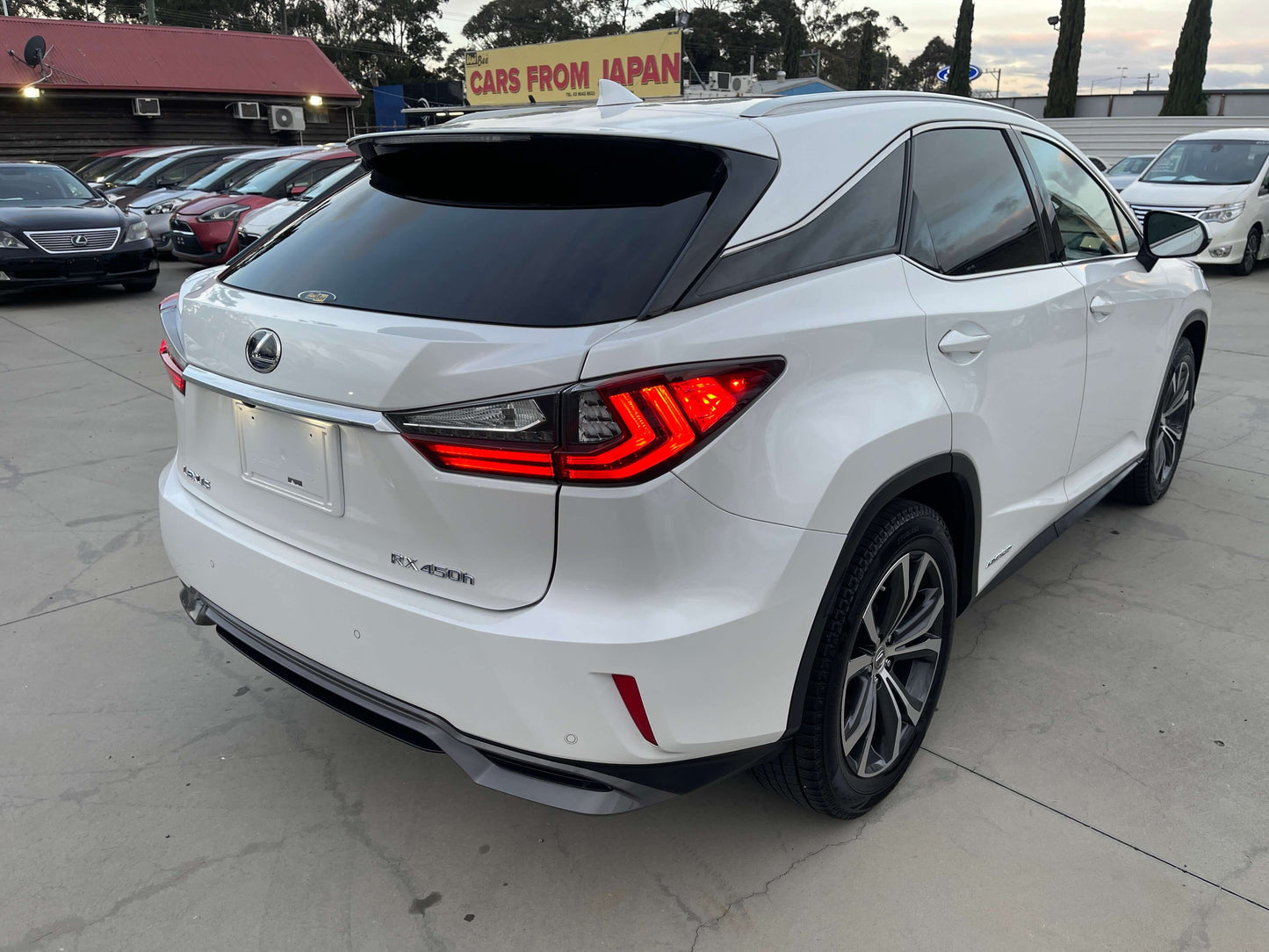 2017 Lexus RX450H V6 3.5L Hybrid L Version luxury SUV rear view, showcasing its sleek design and luxury features.