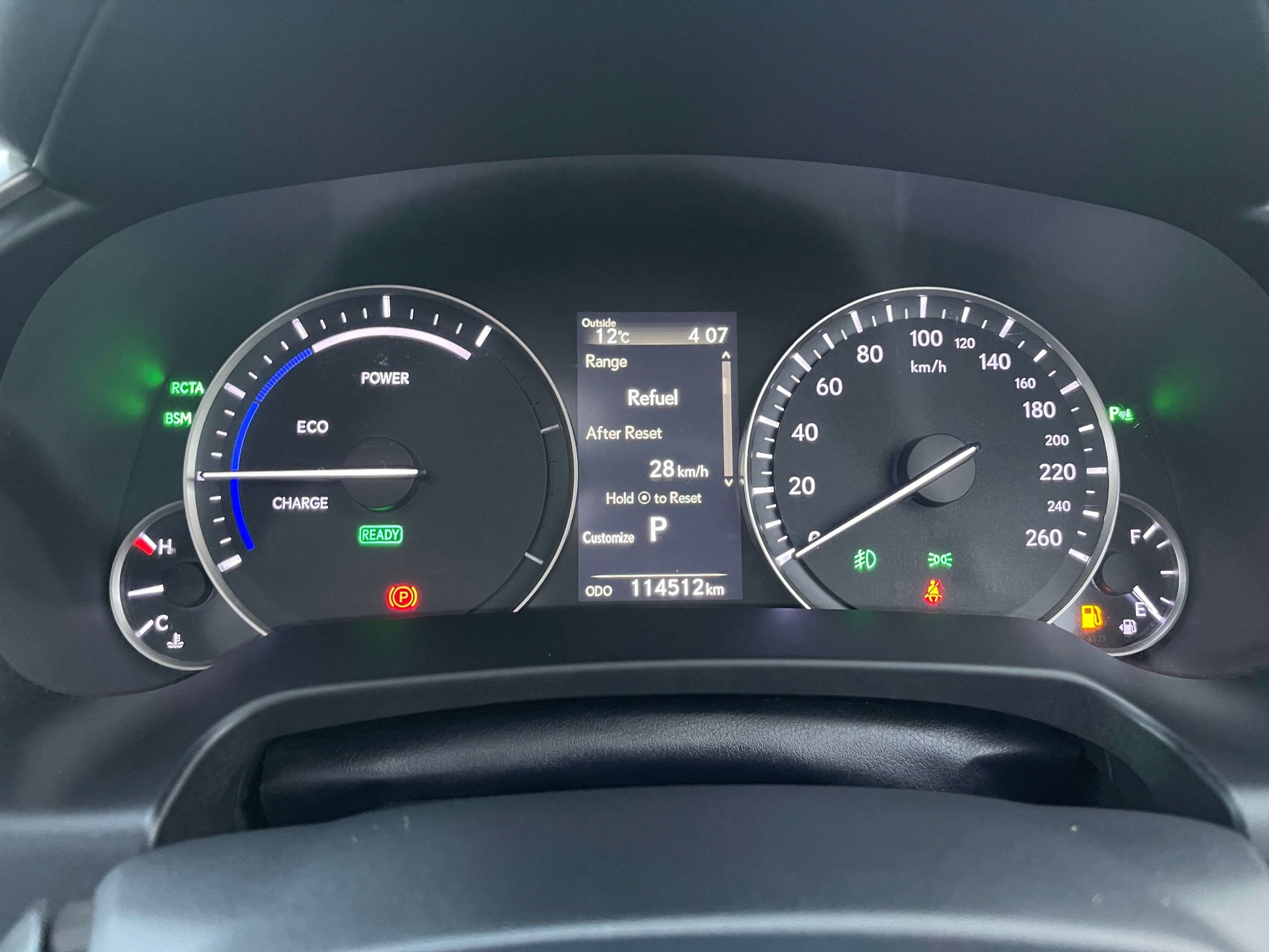 2017 Lexus RX450H dashboard displaying hybrid metrics, including fuel level and speed, with odometer reading 114511 km.