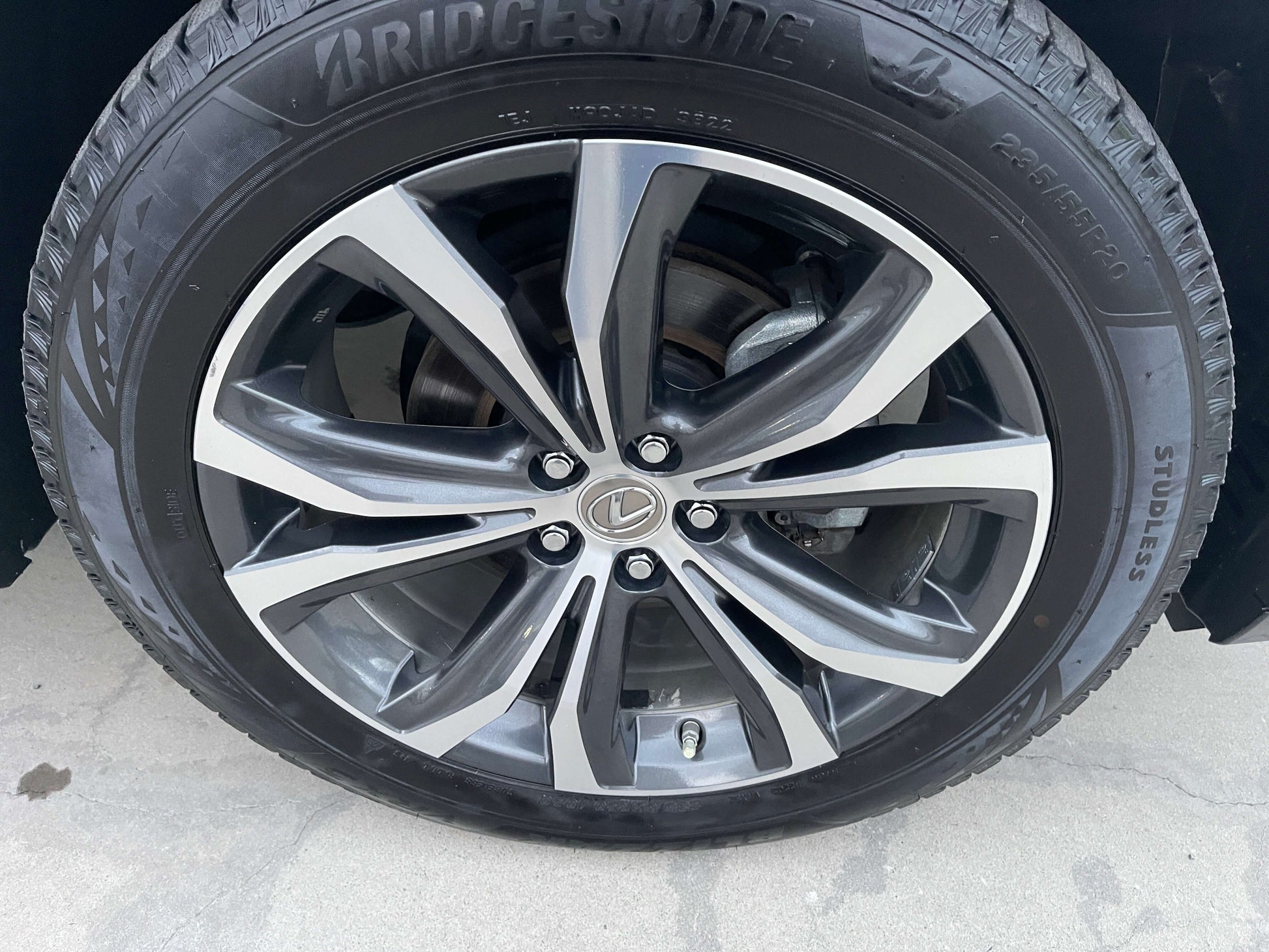 2017 Lexus RX450H luxury SUV wheel with Bridgestone tire, demonstrating premium design and style.