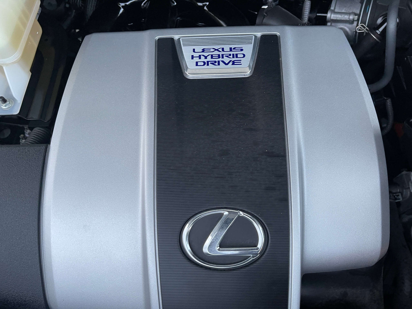 Lexus Hybrid Drive engine cover for 2017 Lexus RX450H V6 3.5L Luxury SUV, showcasing advanced hybrid technology.