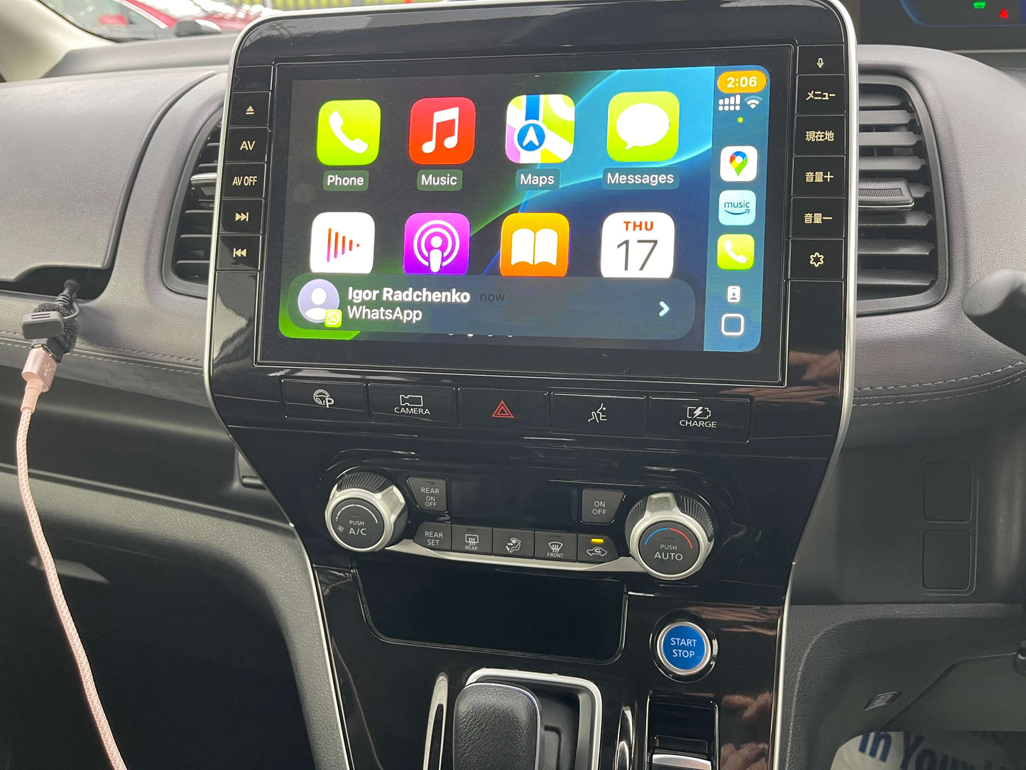 Interior view of the 2020 Nissan Serena 1.2 e-Power showcasing infotainment system and controls.