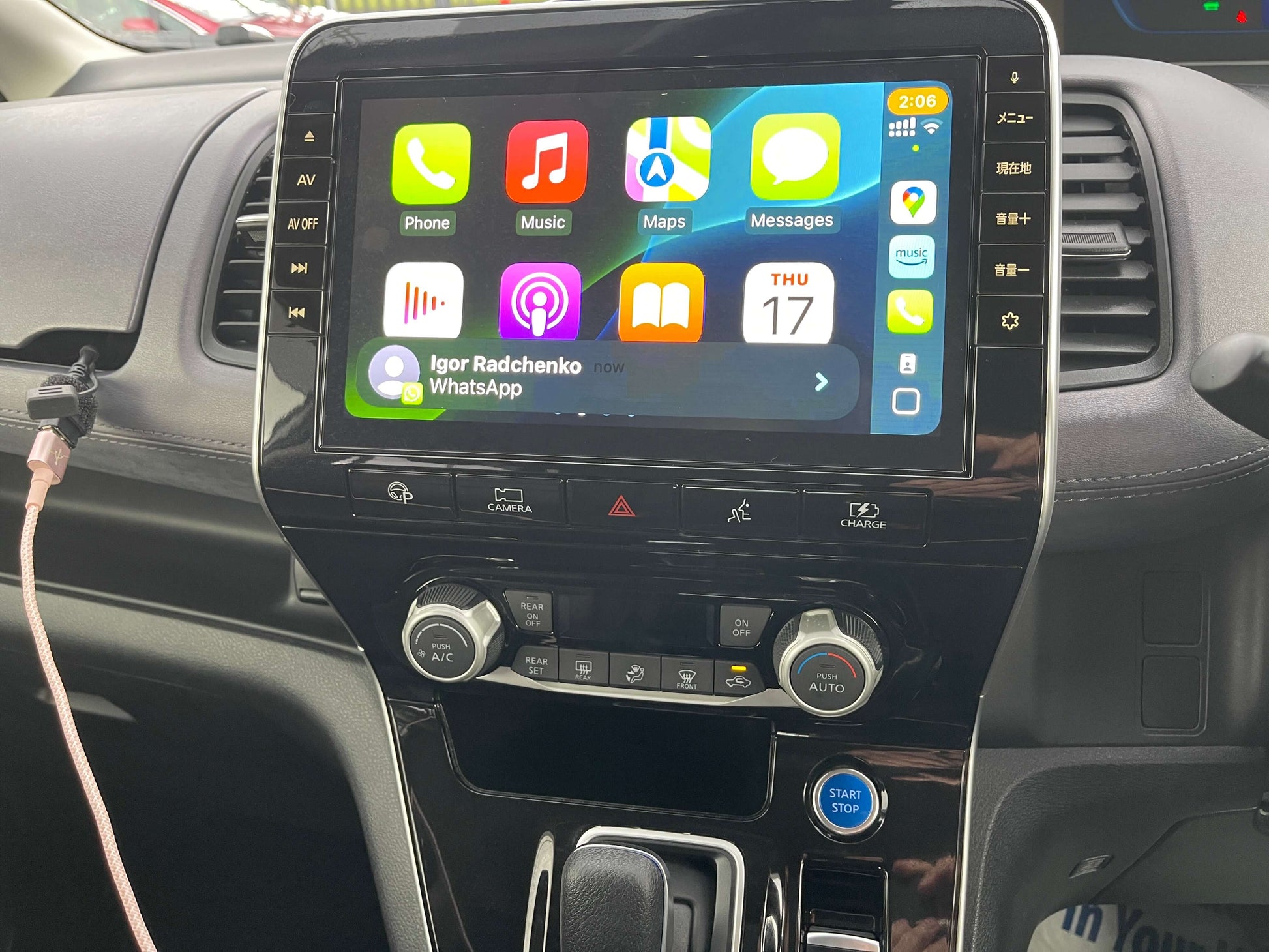 Interior view of the 2020 Nissan Serena 1.2 e-Power showcasing infotainment system and controls.