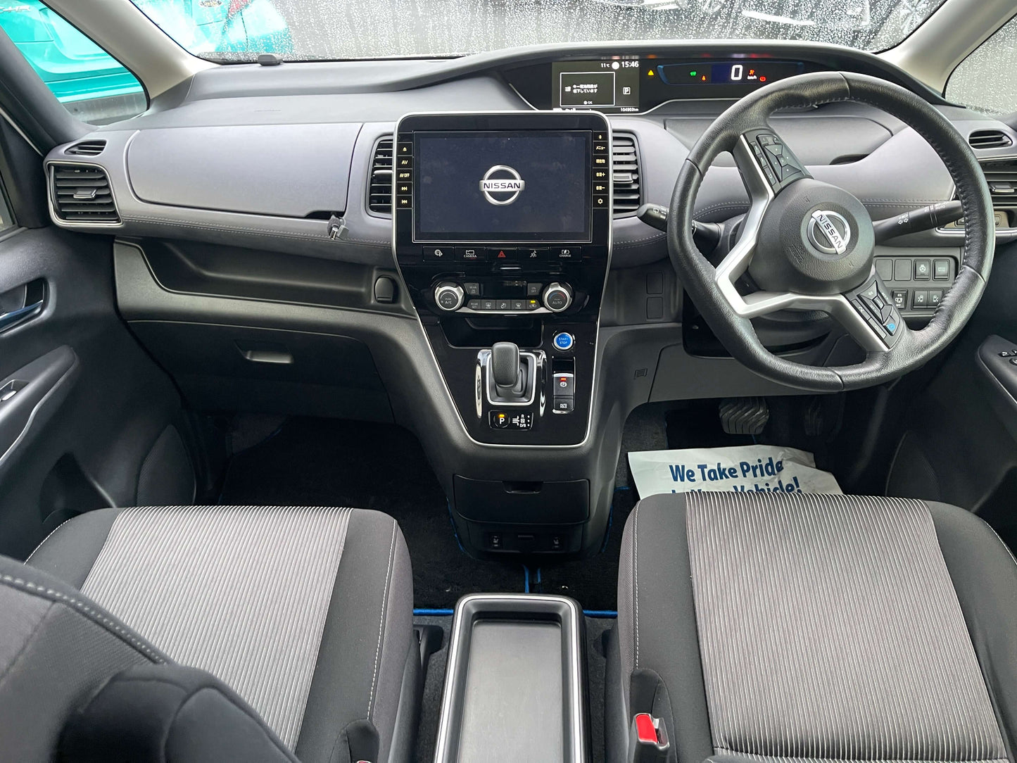 Interior view of a 2020 Nissan Serena 1.2 e-Power with touchscreen, dashboard, and seating.