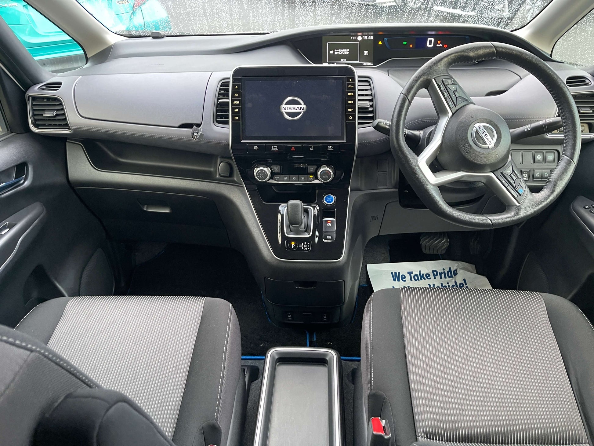 Interior view of a 2020 Nissan Serena 1.2 e-Power with touchscreen, dashboard, and seating.