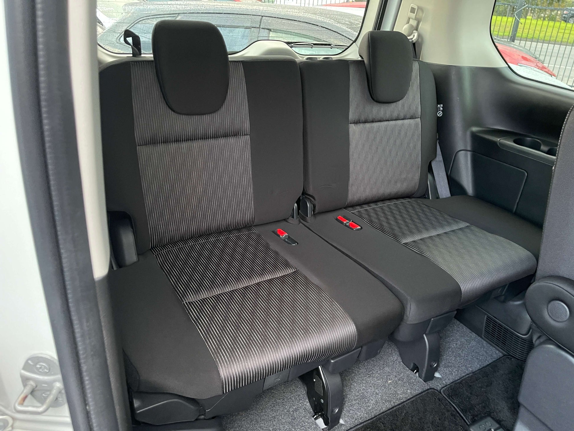 Interior view of the rear seats in a 2020 Nissan Serena 1.2 e-Power, showcasing spacious and comfortable seating for 7.