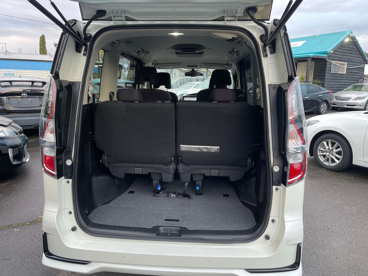 2020 Nissan Serena 1.2 e-Power rear cargo space view showcasing 7-seater interior, perfect for family travel.