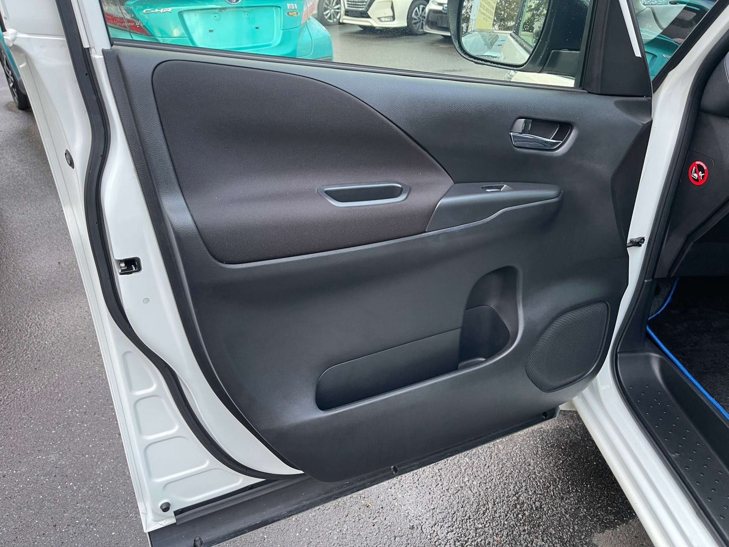 2020 Nissan Serena 1.2 e-Power driver side door interior view showing sleek design and controls.