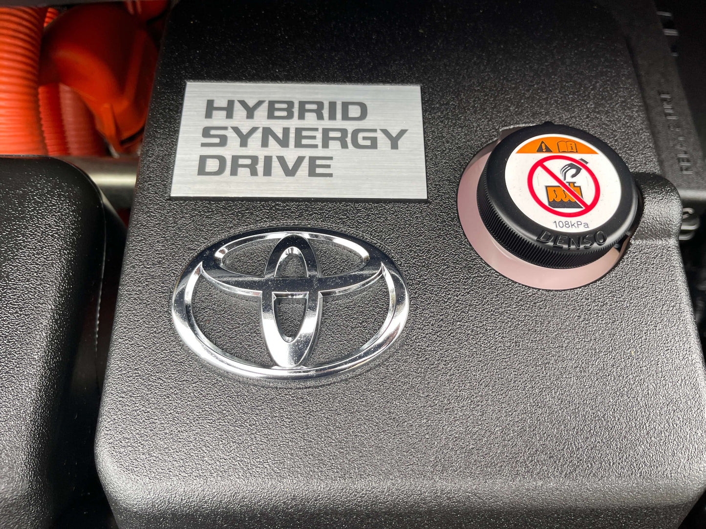 2019 Toyota Alphard 2.5L e-Four Hybrid Executive Lounge engine bay with Hybrid Synergy Drive label