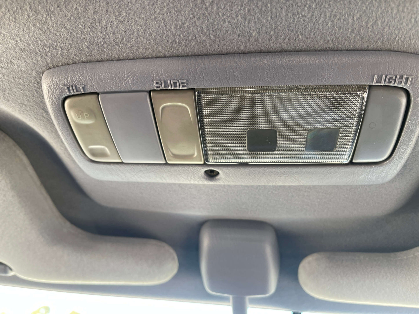 Interior overhead controls for sunroof and lighting in 1996 Toyota Land Cruiser Prado V6 3.4L TZ.