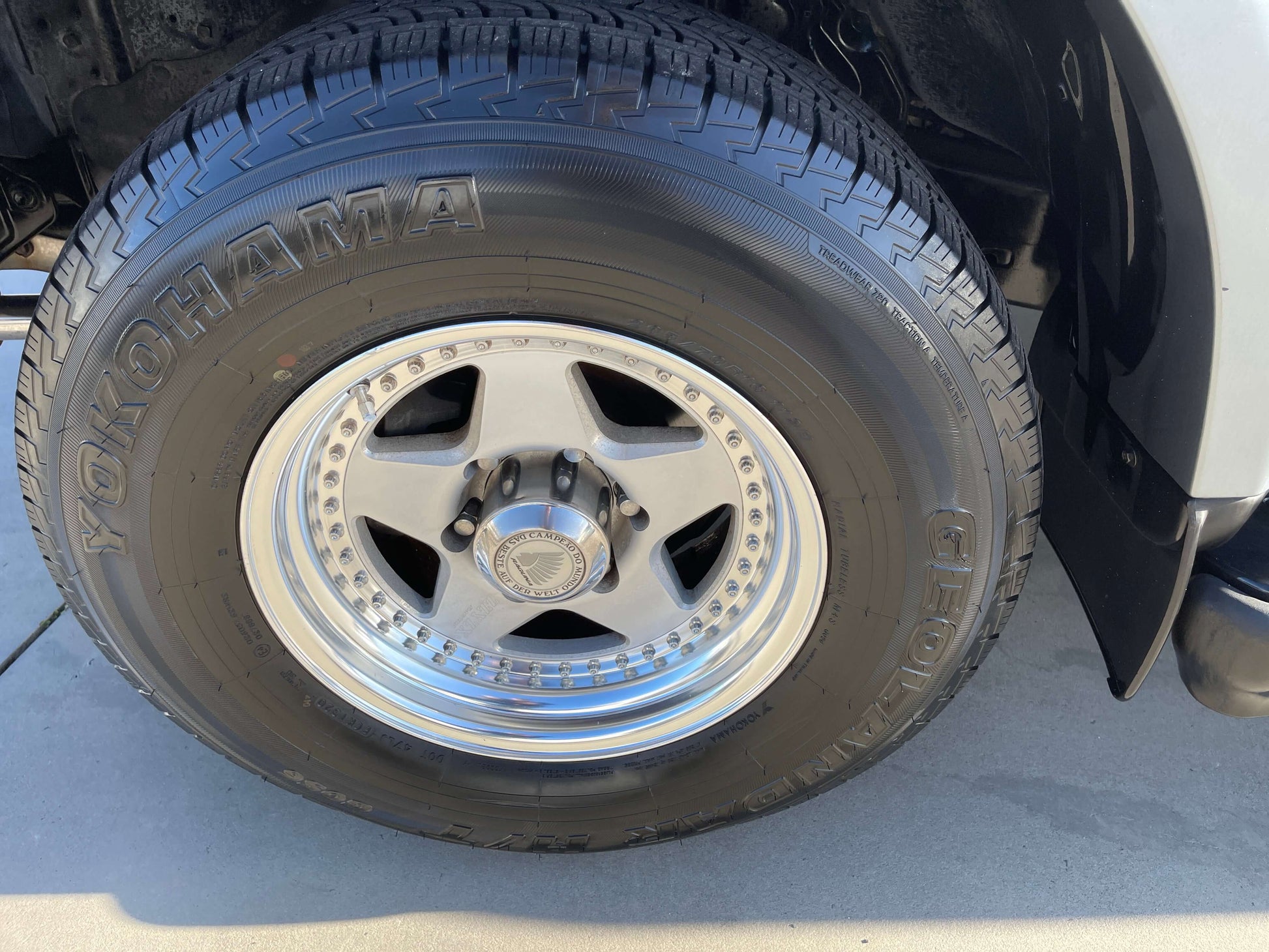 1996 Toyota Land Cruiser Prado V6 3.4L wheel detail with Yokohama tire close-up.