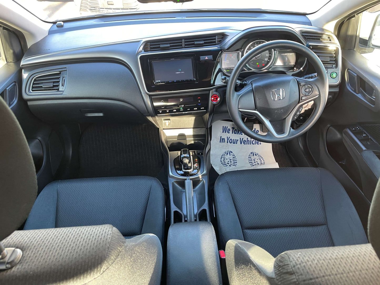 Interior view of 2019 Honda Grace 1.5 Hybrid LX sedan showing dashboard and seating.