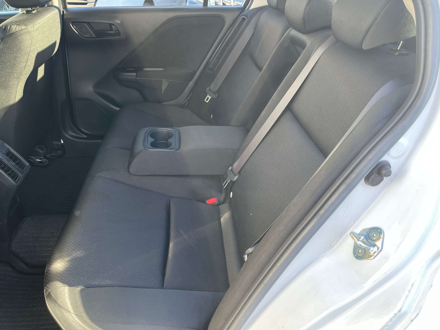 Interior view of the back seat of a 2019 Honda Grace 1.5 Hybrid LX Sedan, showing spacious seating for 5.