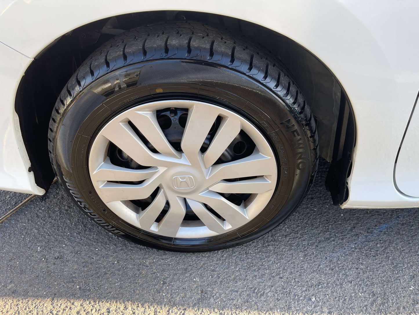 2019 Honda Grace 1.5 Hybrid wheel close-up showing rim design and tire tread.