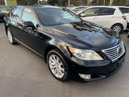 2010 Lexus LS460 AWD V8 4.6L Premium Luxury Sedan in black color parked outdoors.