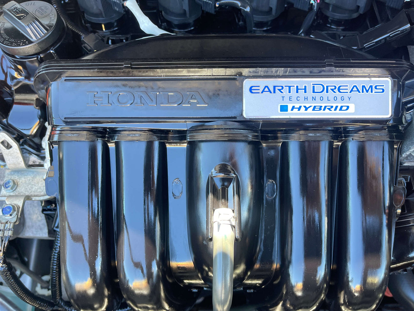 2019 Honda Shuttle 1.5 Hybrid engine featuring Earth Dreams Technology for efficient hybrid performance.