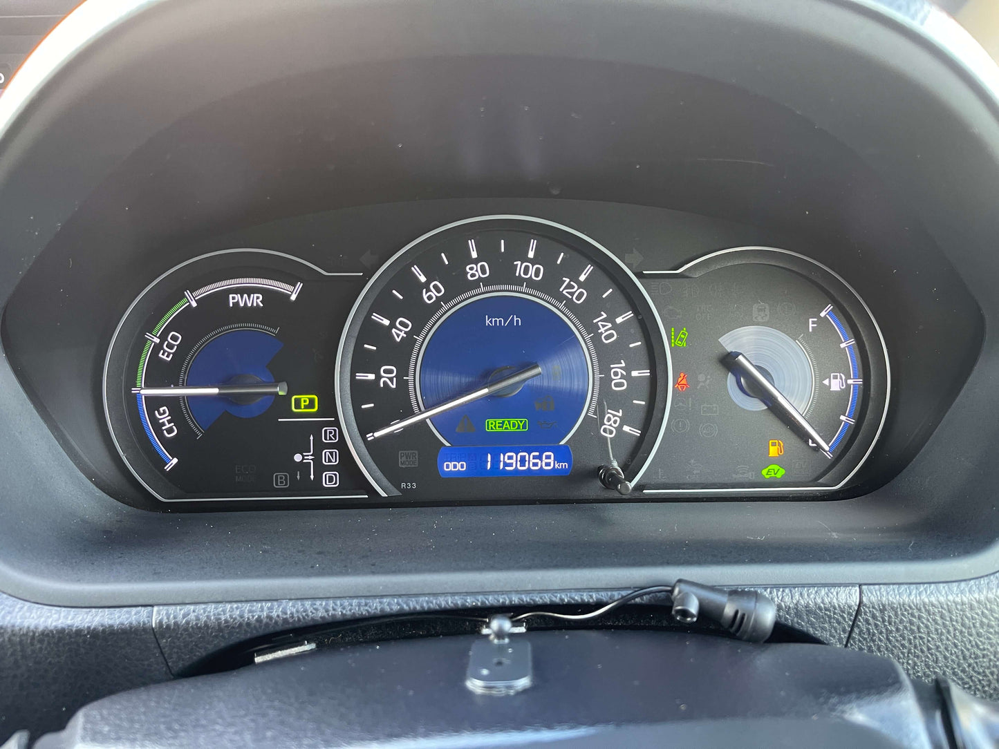 Dashboard of 2018 Toyota Noah 1.8L Hybrid showing speed, fuel, and energy consumption.