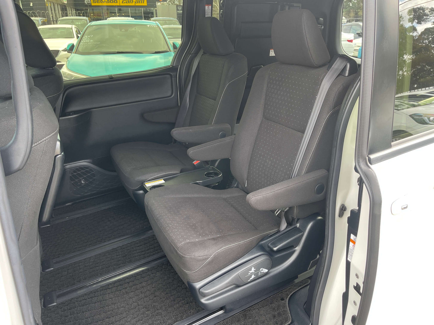 Interior view of 2018 Toyota Noah 1.8L Hybrid G Edition 7 seater showing front seats, spacious and comfortable design.