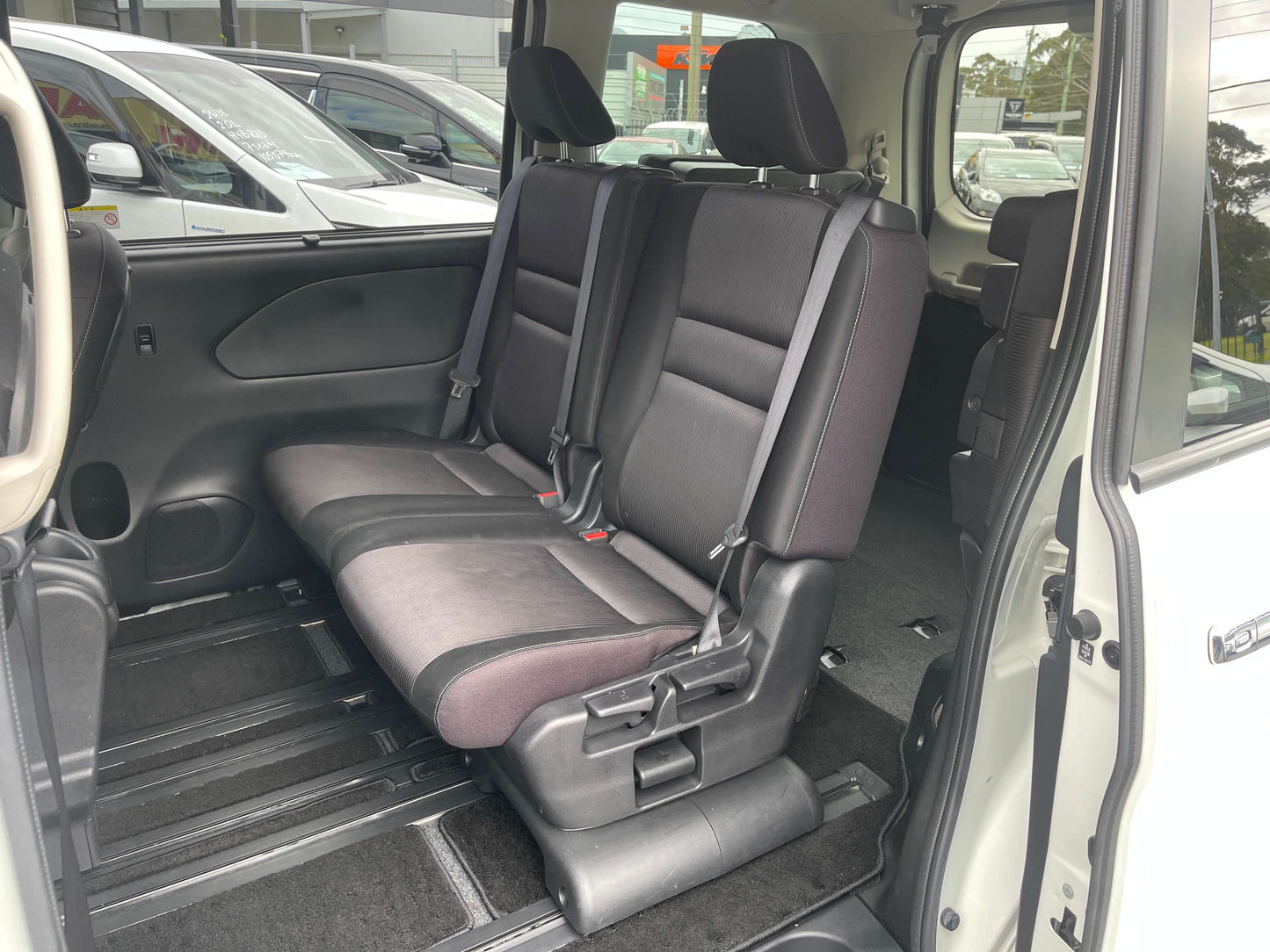 Interior seating of a 2016 Nissan Serena 2.0L S-Hybrid Highway Star G Edition, featuring 8 seats.