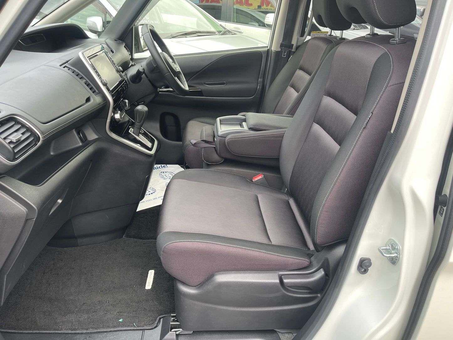 Interior view of 2016 Nissan Serena 2.0L S-Hybrid with comfortable seating for 8 passengers.