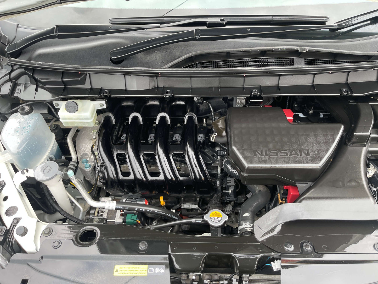 2016 Nissan Serena engine compartment showing the 2.0L S-Hybrid engine and other components.