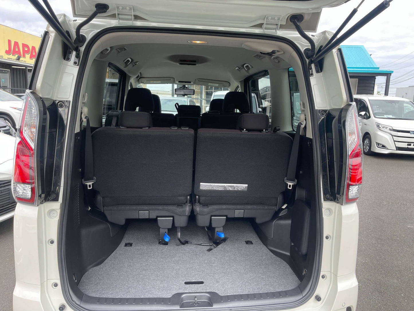 Interior view of the 2016 Nissan Serena showing spacious cargo area and rear seats.