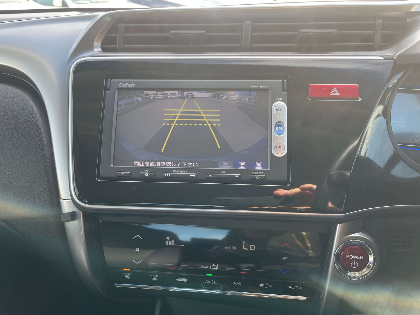 Interior dashboard display of the 2015 Honda Grace 1.5 Hybrid DX Sedan showing reverse camera view.