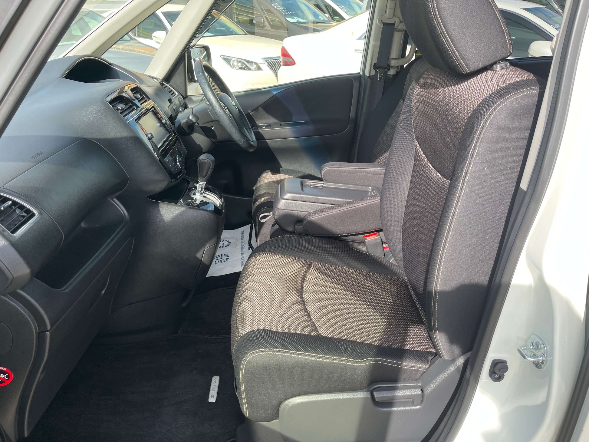 Interior of 2016 Nissan Serena 2.0L S-Hybrid Highway Star, featuring spacious seating and modern dashboard design.