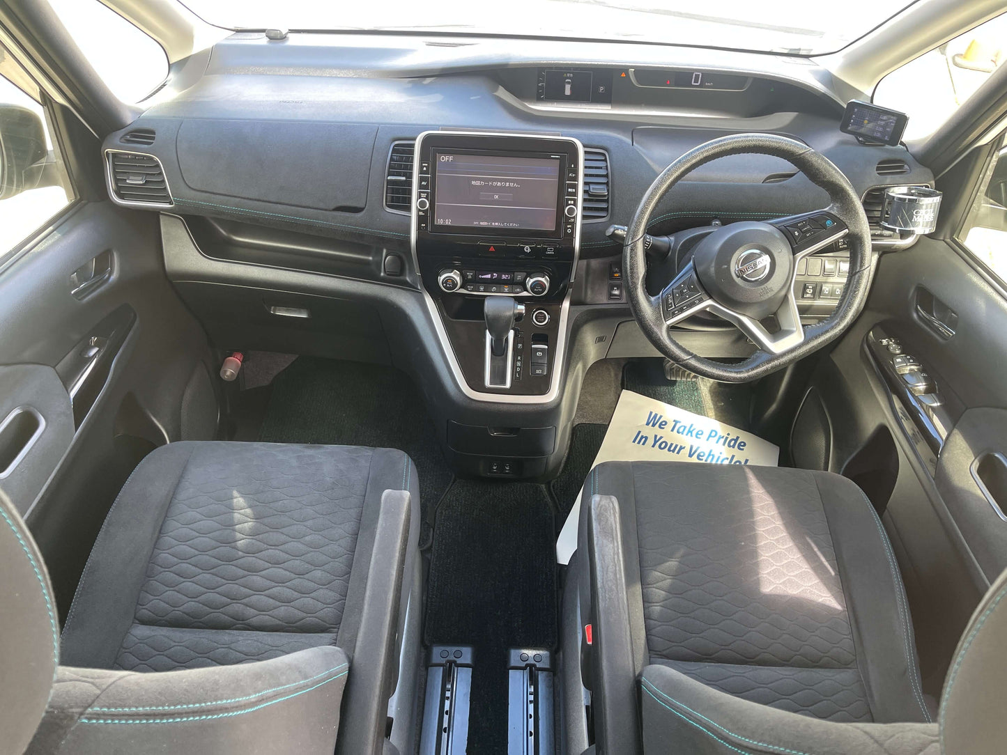 Interior view of the 2016 Nissan Serena 2.0L S-Hybrid Rider Autech Edition showing dashboard and seating.