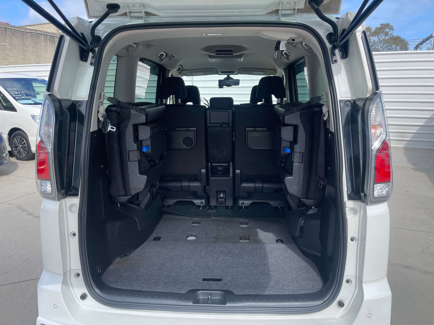 Interior view of the 2016 Nissan Serena 2.0L S-Hybrid Rider Autech Edition showing spacious seating area with 8 seats.
