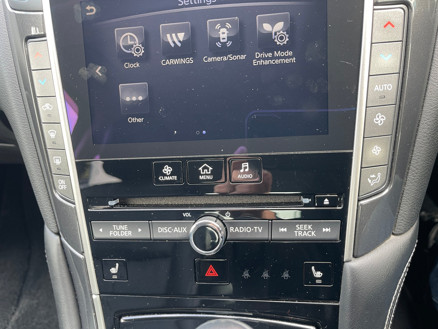 Dashboard controls and settings display of a 2016 Nissan Skyline V6 3.5L Hybrid 350GT Sport Sedan.