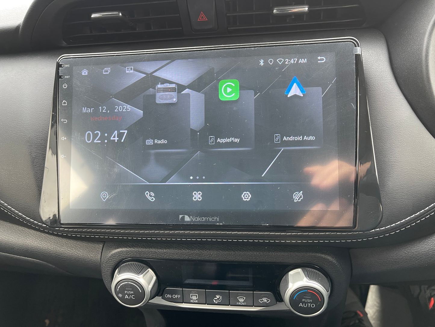Interior display of the 2020 Nissan Kicks e-Power X Edition featuring navigation and media settings.