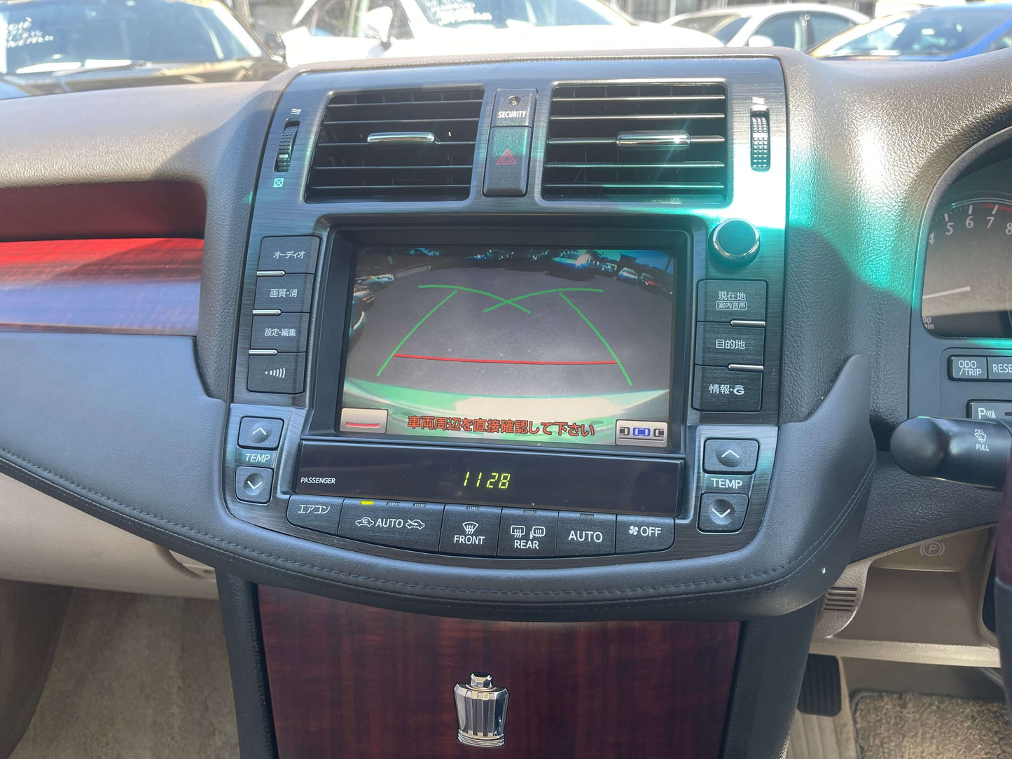 Interior dashboard of 2008 Toyota Crown V6 3.0L Royal Saloon showing navigation and rearview camera display.