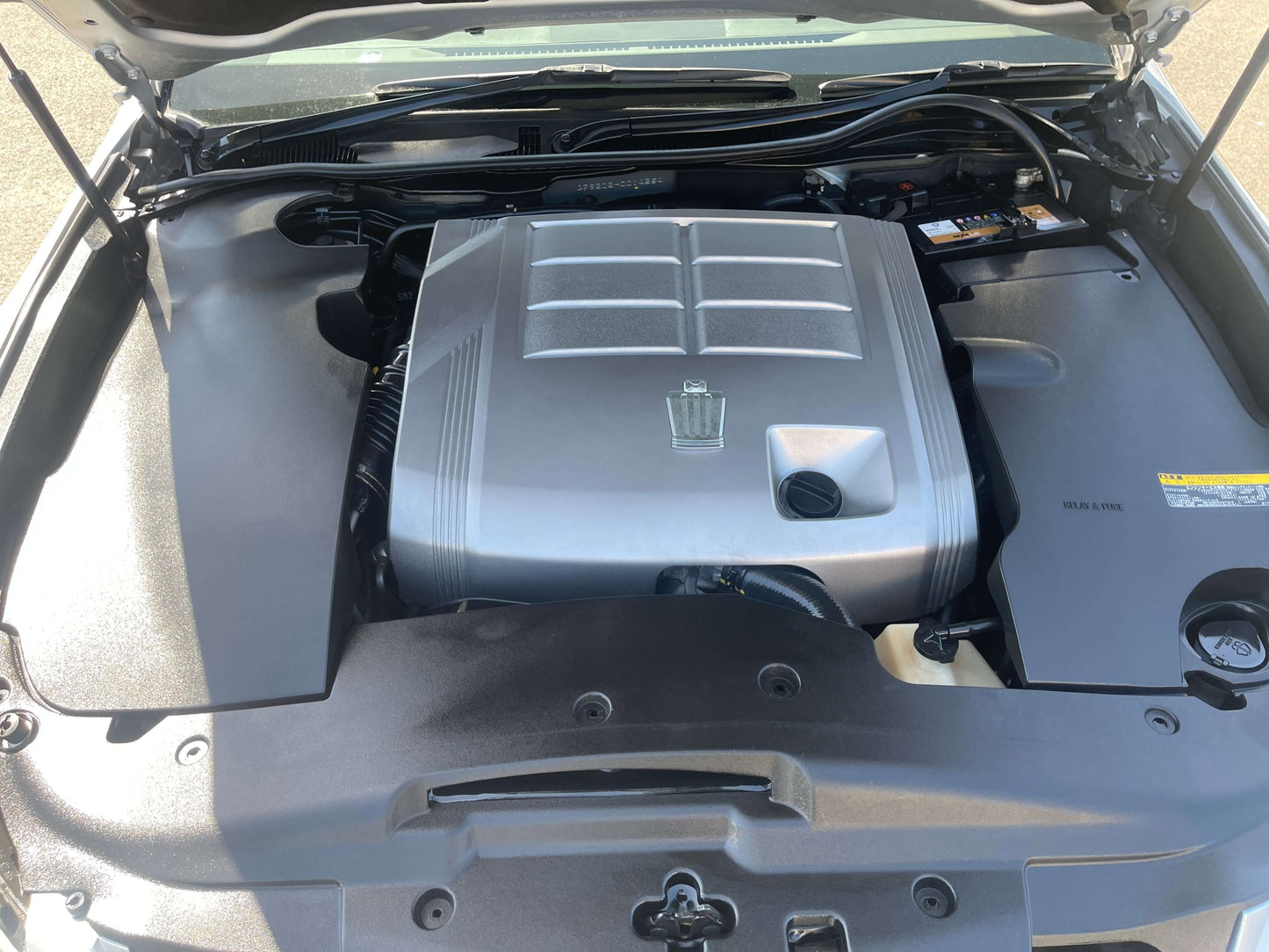 Engine compartment view of 2008 Toyota Crown V6 3.0L Royal Saloon Luxury Sedan showcasing the powerful V6 engine.