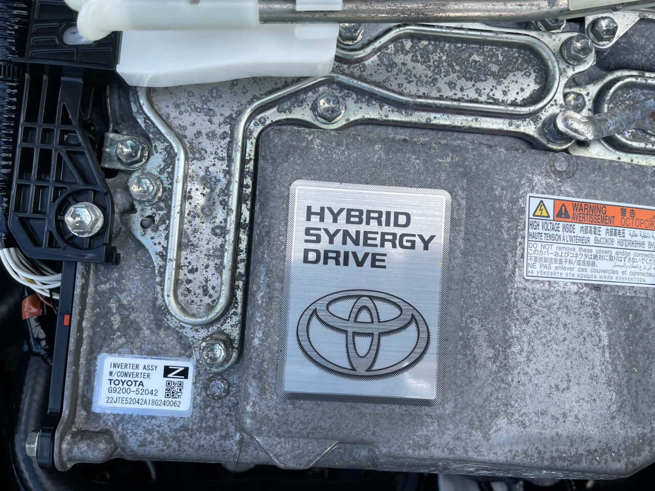 Hybrid Synergy Drive engine component from 2018 Toyota Sienta 1.5L Hybrid, showcasing eco-friendly technology and performance.
